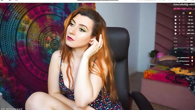 Red-haired fake girl Andrea Menes communicates with subscribers