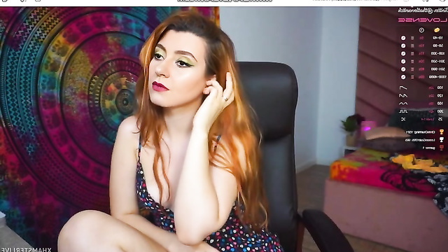 Red-haired fake girl Andrea Menes communicates with subscribers