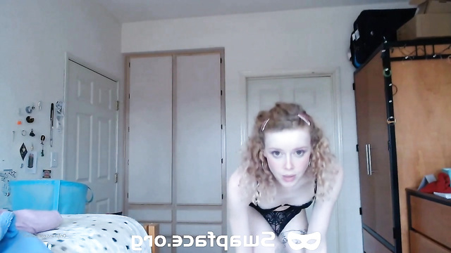 Cutie Natasha Lyonne doing a striptease and jerking her cock to hardness